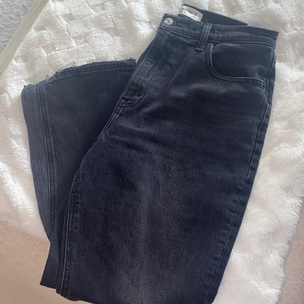 Abercrombie & Fitch high waisted dark gray/black jeans with flare ish bottom.